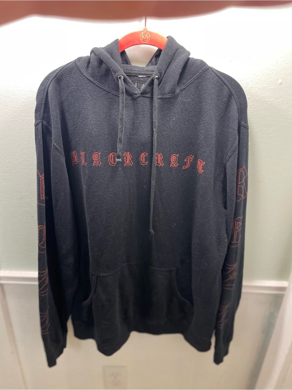 Blackcraft Cult hoodie features a prominent gothic red logo